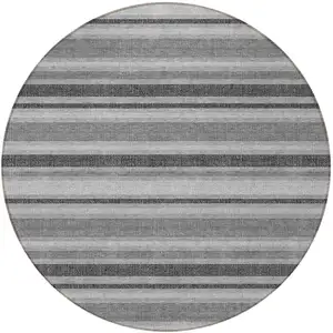 Photo of 8' Round Gray and Black Round Striped Washable Non Skid Indoor Outdoor Area Rug