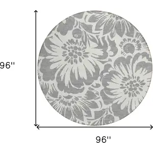 Photo of 8' Round Gray and Ivory Round Floral Washable Non Skid Indoor Outdoor Area Rug