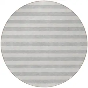 Photo of 8' Round Gray and Ivory Round Striped Washable Non Skid Indoor Outdoor Area Rug