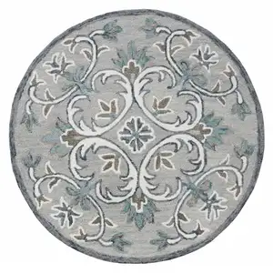 Photo of 6' Round Gray and White Filigree Area Rug