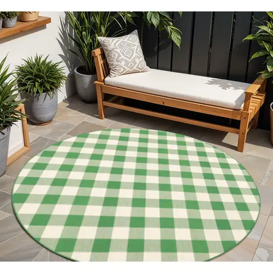 Green and Ivory Round Geometric Stain Resistant Indoor Outdoor Area Rug Photo 1