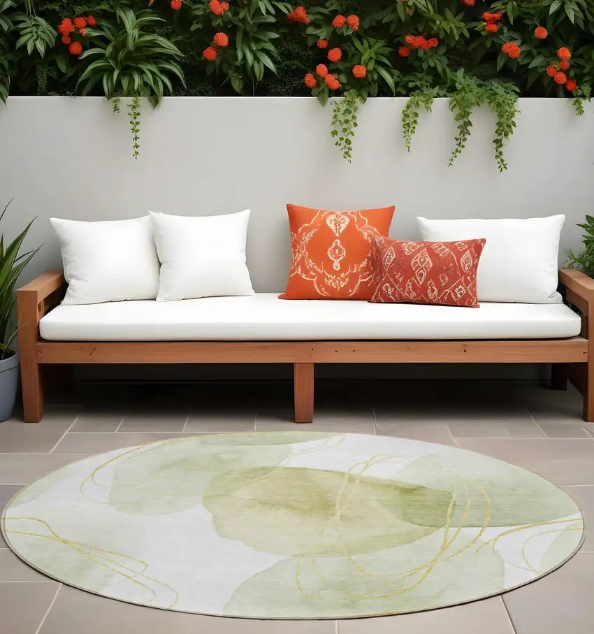 Green and Ivory Round Abstract Washable Non Skid Indoor Outdoor Area Rug Photo 1