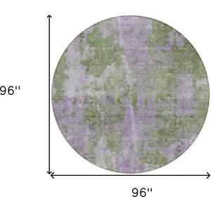 Photo of 8' Round Green and Purple Round Abstract Washable Non Skid Indoor Outdoor Area Rug