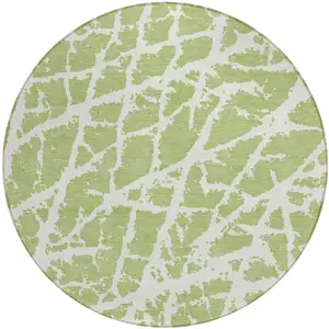 Photo of 8' Round Green and White Round Abstract Washable Non Skid Indoor Outdoor Area Rug