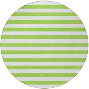 Photo of 8' Round Green and White Round Striped Washable Non Skid Indoor Outdoor Area Rug