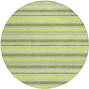 Photo of 8' Round Green and Yellow Round Striped Washable Non Skid Indoor Outdoor Area Rug