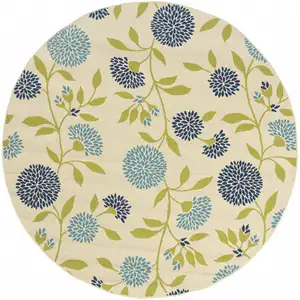 Photo of 8' Round Ivory Round Floral Stain Resistant Indoor Outdoor Area Rug