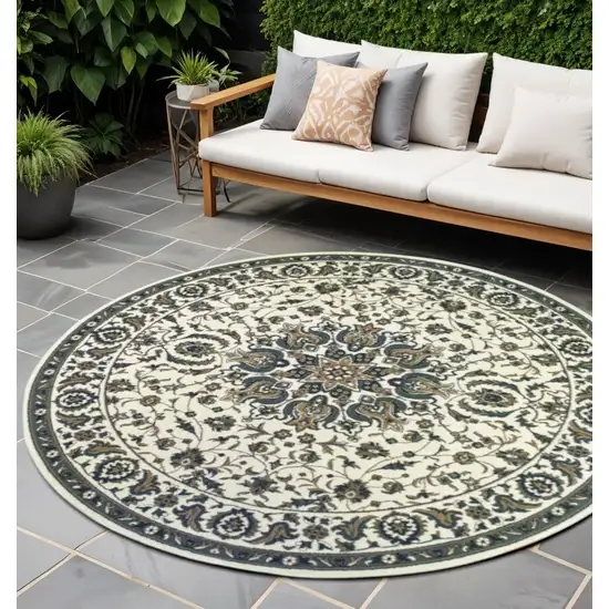 Ivory and Blue Round Oriental Stain Resistant Indoor Outdoor Area Rug Photo 1