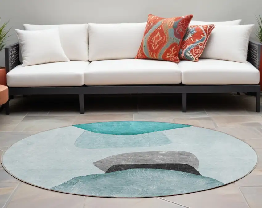 8' Round Ivory Teal and Gray Round Abstract Washable Non Skid Indoor Outdoor Area Rug Photo 1