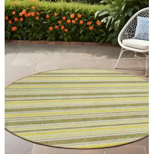 Photo of 8' Round Khaki Round Striped Washable Non Skid Indoor Outdoor Area Rug