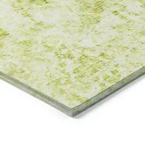 Photo of 8' Round Lime Green Round Abstract Washable Non Skid Indoor Outdoor Area Rug