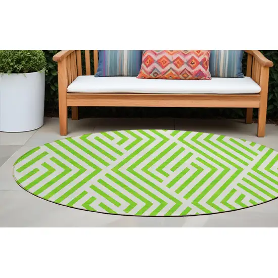 Lime Green and White Round Geometric Washable Non Skid Indoor Outdoor Area Rug Photo 1