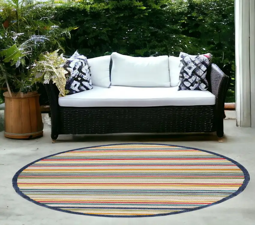 Ivory And Blue Round Striped Stain Resistant Indoor Outdoor Area Rug Photo 1
