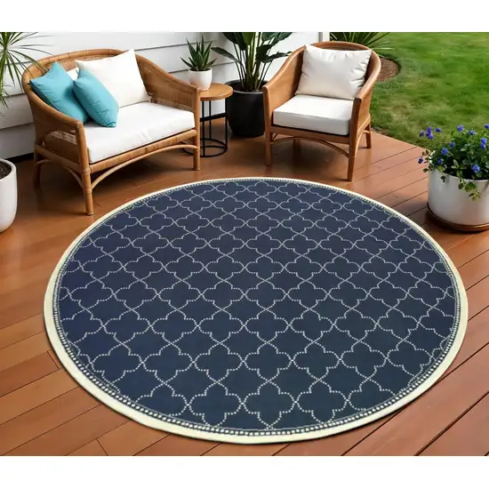 Blue and Ivory Round Geometric Stain Resistant Indoor Outdoor Area Rug Photo 1