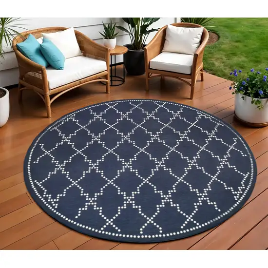 Blue and Ivory Round Geometric Stain Resistant Indoor Outdoor Area Rug Photo 1