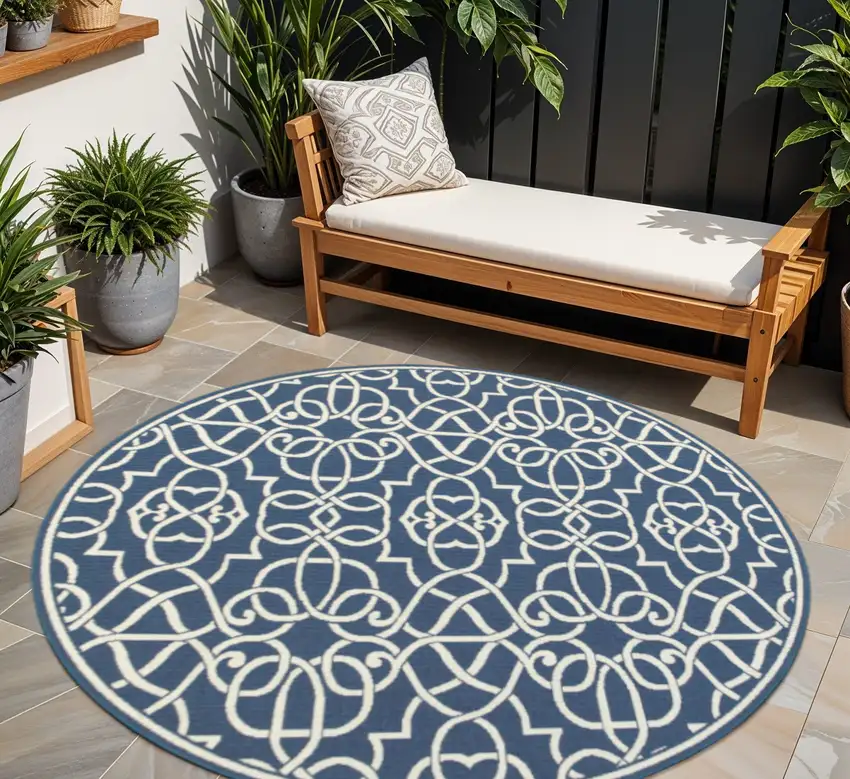 Blue and Ivory Round Geometric Stain Resistant Indoor Outdoor Area Rug Photo 1