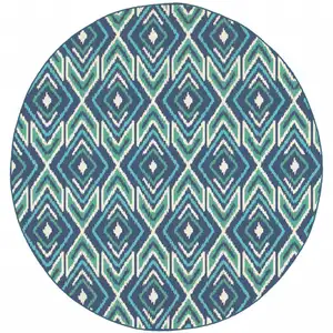 Photo of 8' Round Navy Round Geometric Stain Resistant Indoor Outdoor Area Rug