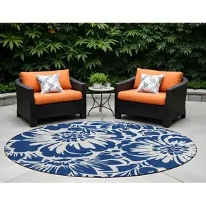 Photo of 8' Round Navy and Ivory Round Floral Washable Non Skid Indoor Outdoor Area Rug