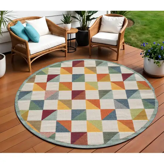 Orange And Ivory Round Geometric Stain Resistant Indoor Outdoor Area Rug Photo 2