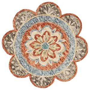 Photo of 4' Round Orange Scalloped Edge Area Rug