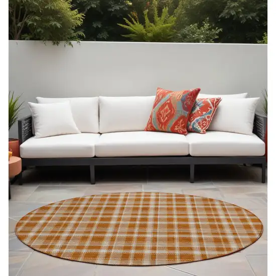 Orange and Ivory Round Plaid Washable Non Skid Indoor Outdoor Area Rug Photo 1