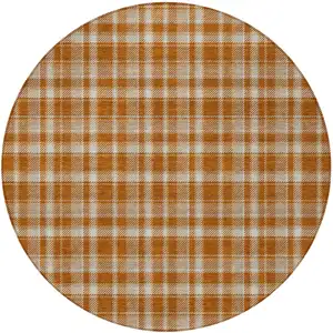 Photo of 8' Round Orange and Ivory Round Plaid Washable Non Skid Indoor Outdoor Area Rug