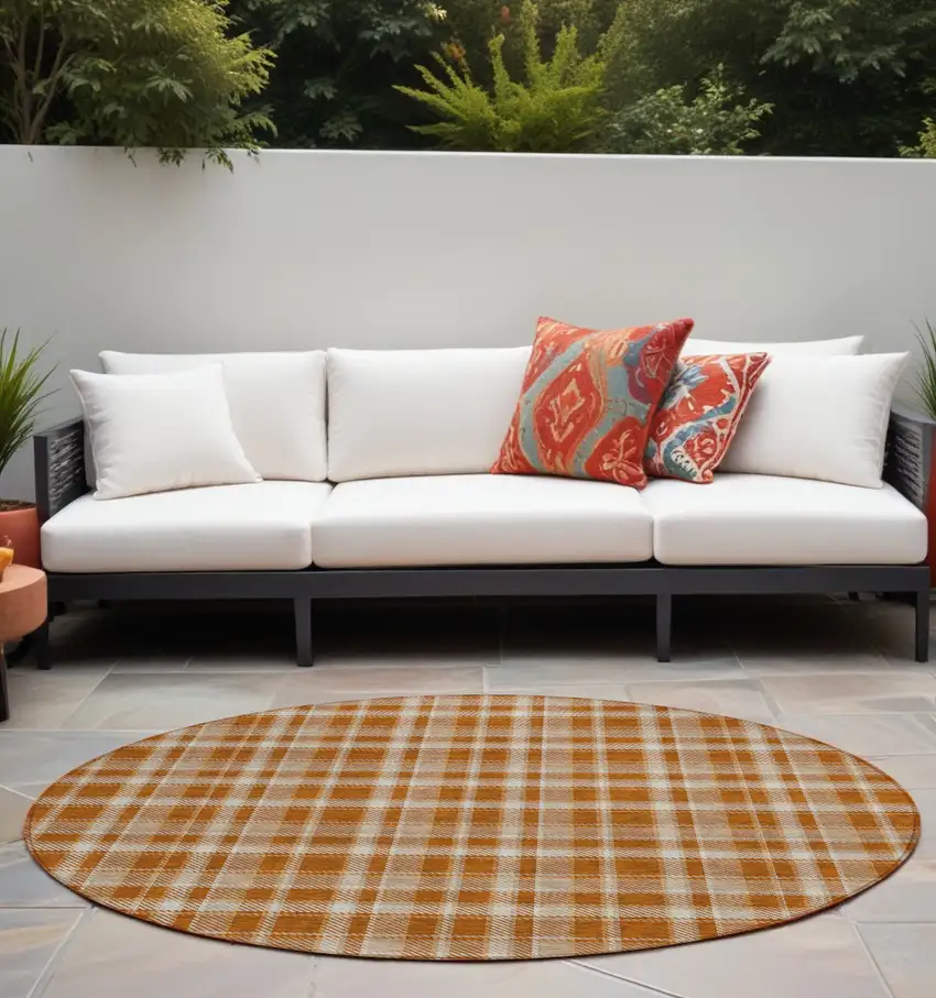 8' Round Orange and Ivory Round Plaid Washable Non Skid Indoor Outdoor Area Rug Photo 1