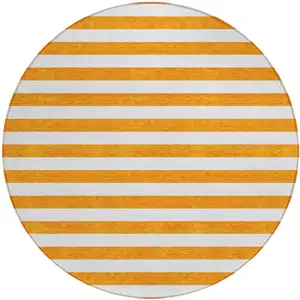 Photo of 8' Round Orange and White Round Striped Washable Non Skid Indoor Outdoor Area Rug