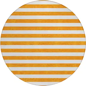 Photo of 8' Round Orange and White Round Striped Washable Non Skid Indoor Outdoor Area Rug