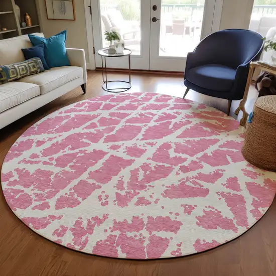 Pink and Ivory Round Abstract Washable Non Skid Indoor Outdoor Area Rug Photo 9