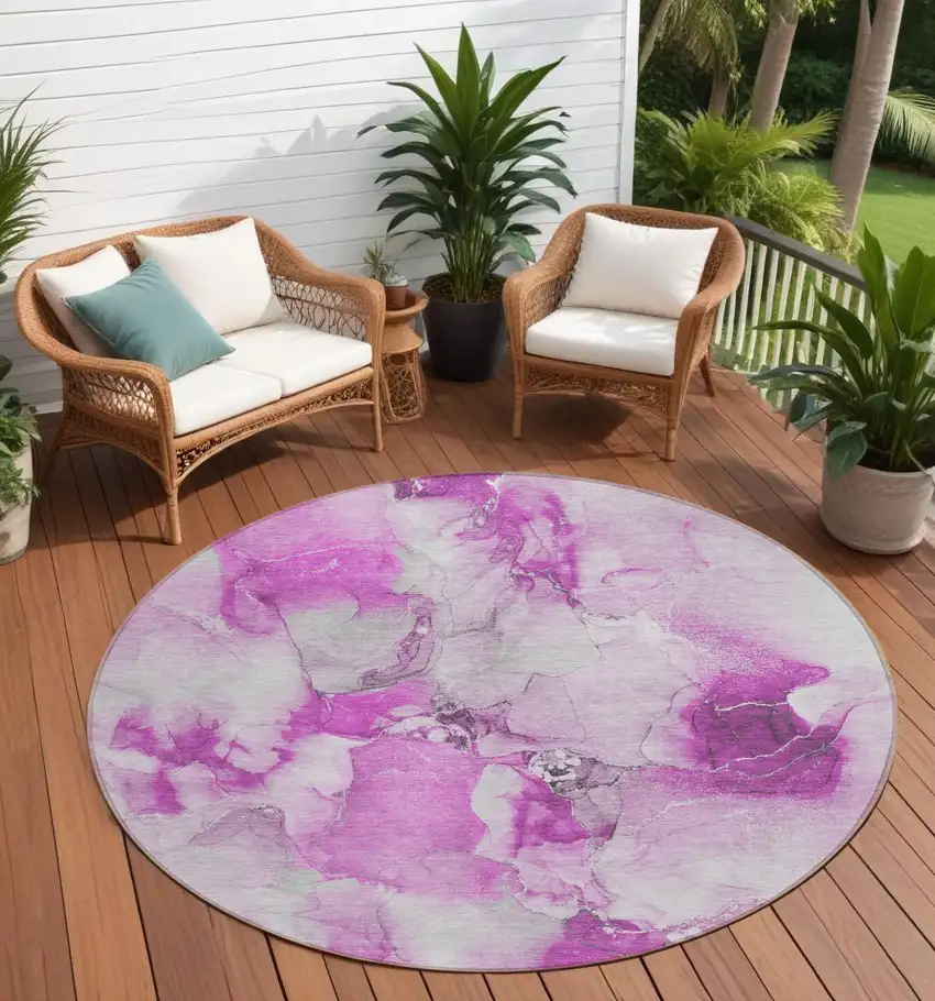 Pink and Ivory Round Abstract Washable Non Skid Indoor Outdoor Area Rug Photo 1