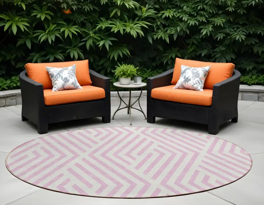 8' Round Pink and White Round Geometric Washable Non Skid Indoor Outdoor Area Rug Photo 1