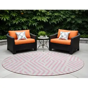 Photo of 8' Round Pink and White Round Geometric Washable Non Skid Indoor Outdoor Area Rug