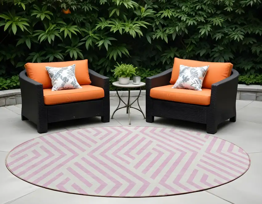 8' Round Pink and White Round Geometric Washable Non Skid Indoor Outdoor Area Rug Photo 1