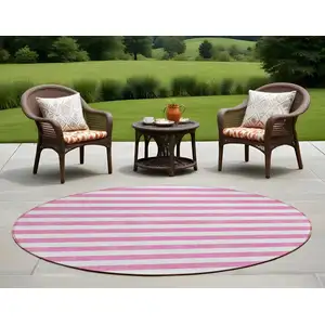 Photo of 8' Round Pink and White Round Striped Washable Non Skid Indoor Outdoor Area Rug