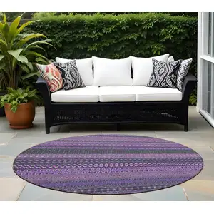 Photo of 8' Round Purple Round Striped Washable Non Skid Indoor Outdoor Area Rug
