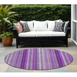 Photo of 8' Round Purple Round Striped Washable Non Skid Indoor Outdoor Area Rug