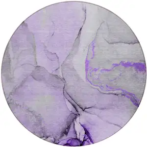 Photo of 8' Round Purple and Ivory Round Abstract Washable Non Skid Indoor Outdoor Area Rug