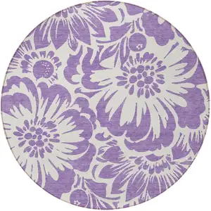 Photo of 8' Round Purple and Ivory Round Floral Washable Non Skid Indoor Outdoor Area Rug