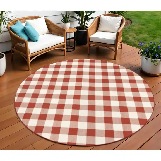 Red and Ivory Round Geometric Stain Resistant Indoor Outdoor Area Rug Photo 1