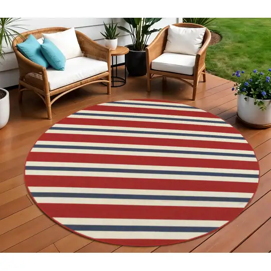 Red and Ivory Round Geometric Stain Resistant Indoor Outdoor Area Rug Photo 1