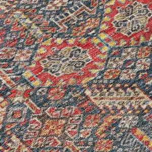 Photo of 8' Round Red and Dark Blue Round Floral Washable Non Skid Indoor Outdoor Area Rug
