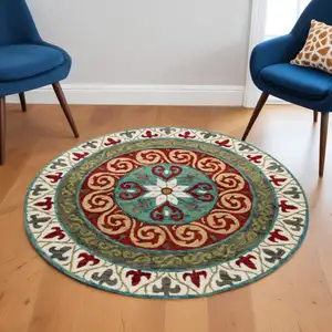 Photo of 5' Round Red and Sage Medallion Area Rug