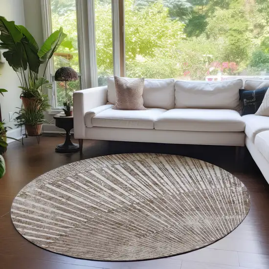 Taupe and Ivory Round Abstract Washable Non Skid Indoor Outdoor Area Rug Photo 9