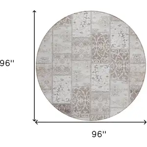 Photo of 8' Round Taupe and Ivory Round Patchwork Washable Non Skid Indoor Outdoor Area Rug