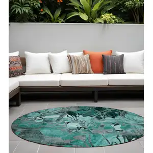 Photo of 8' Round Teal Black and Gray Round Floral Washable Non Skid Indoor Outdoor Area Rug