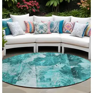 Photo of 8' Round Teal Round Floral Washable Non Skid Indoor Outdoor Area Rug