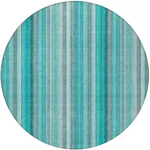 Photo of 8' Round Teal and Gray Round Striped Washable Non Skid Indoor Outdoor Area Rug