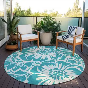 Photo of 8' Round Teal and Ivory Round Floral Washable Non Skid Indoor Outdoor Area Rug