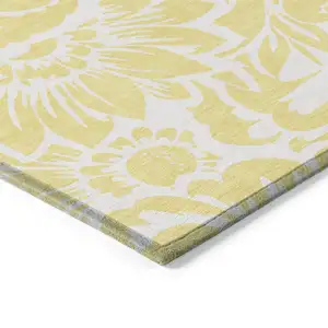Photo of 8' Round Yellow and Ivory Round Floral Washable Non Skid Indoor Outdoor Area Rug